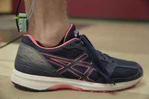 The UW-Madison engineers’ device for measuring tendon tension is placed over a person’s Achilles tendon. Photo: Renee Meiller.
